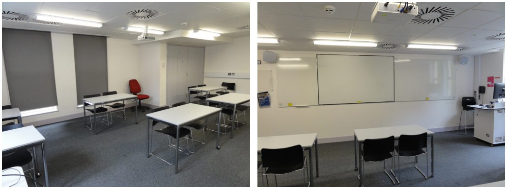 Classroom with rows of tables and chairs.